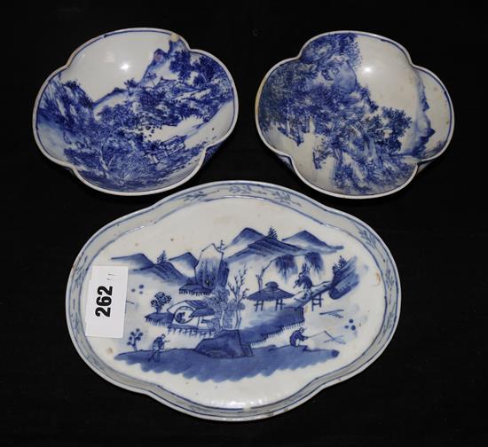 A Japanese figure of Shi-Shi and three blue and white dishes